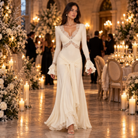 Ivory lace trim long sleeve maxi dress – styled at a party